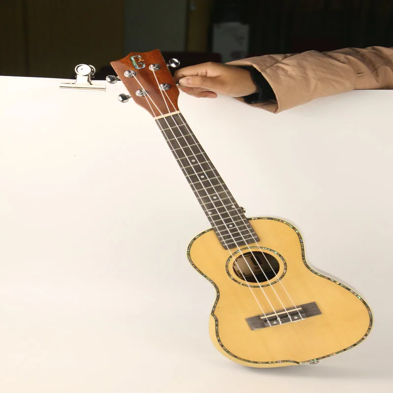 Yamaha การแสดงดนตรีร็อคอิเล็กทรอนิกส์ผู้ใหญ่ดึงอูคูเลเล่พื้นบ้านคลาสสิกอูคูเลเล่เริ่มต้น 8
