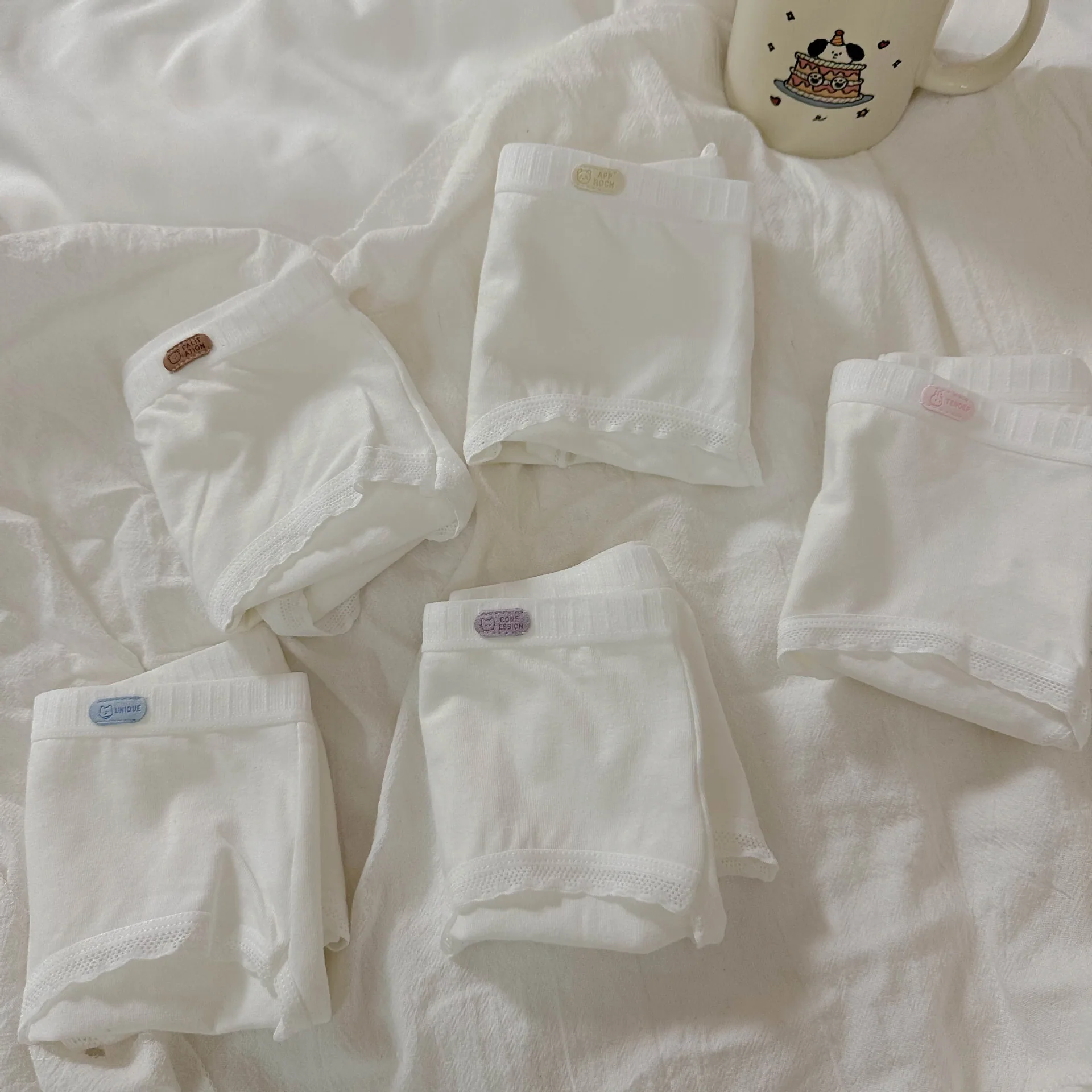 Solid color Japanese pure cotton underwear for women, breathable and comfortable, low waist for women and girls, pure cotton tri
