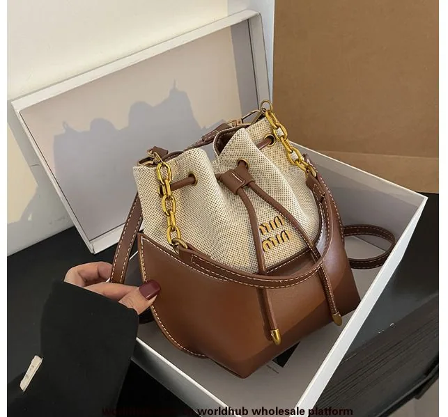 2024 Cross border new niche design French hand-held bucket bag, womens trendy canvas contrasting single shoulder crossbody bag 2