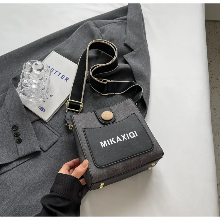Wholesale 2024 new high-end texture cute temperament denim style small volume large capacity diagonal cross bucket bag womens