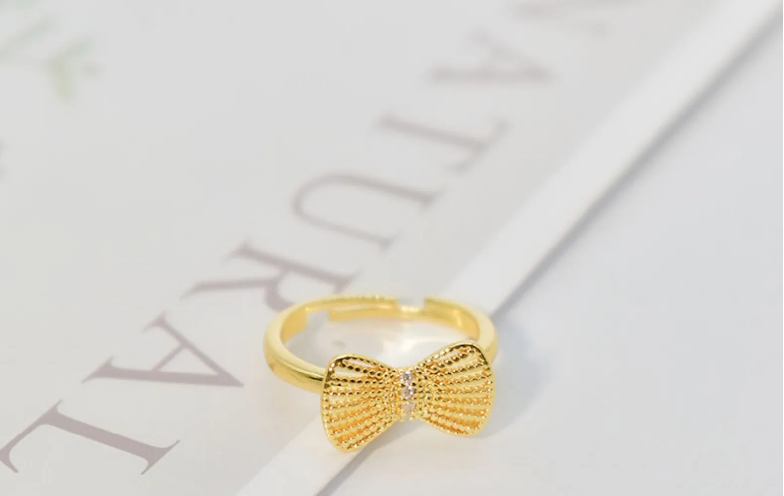 Version coréenne populaire de la même bague à nœud, simple et à la mode, personnalisée pour femmes, index creux, vente en gros 10
