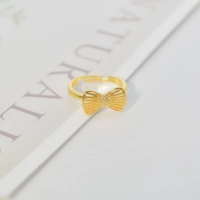 Popular Korean version of the same bow ring ins simple and fashionable personalized womens hollow index finger ring spot wholesa