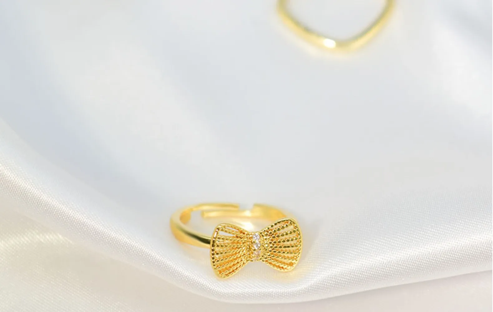 Version coréenne populaire de la même bague à nœud, simple et à la mode, personnalisée pour femmes, index creux, vente en gros 19