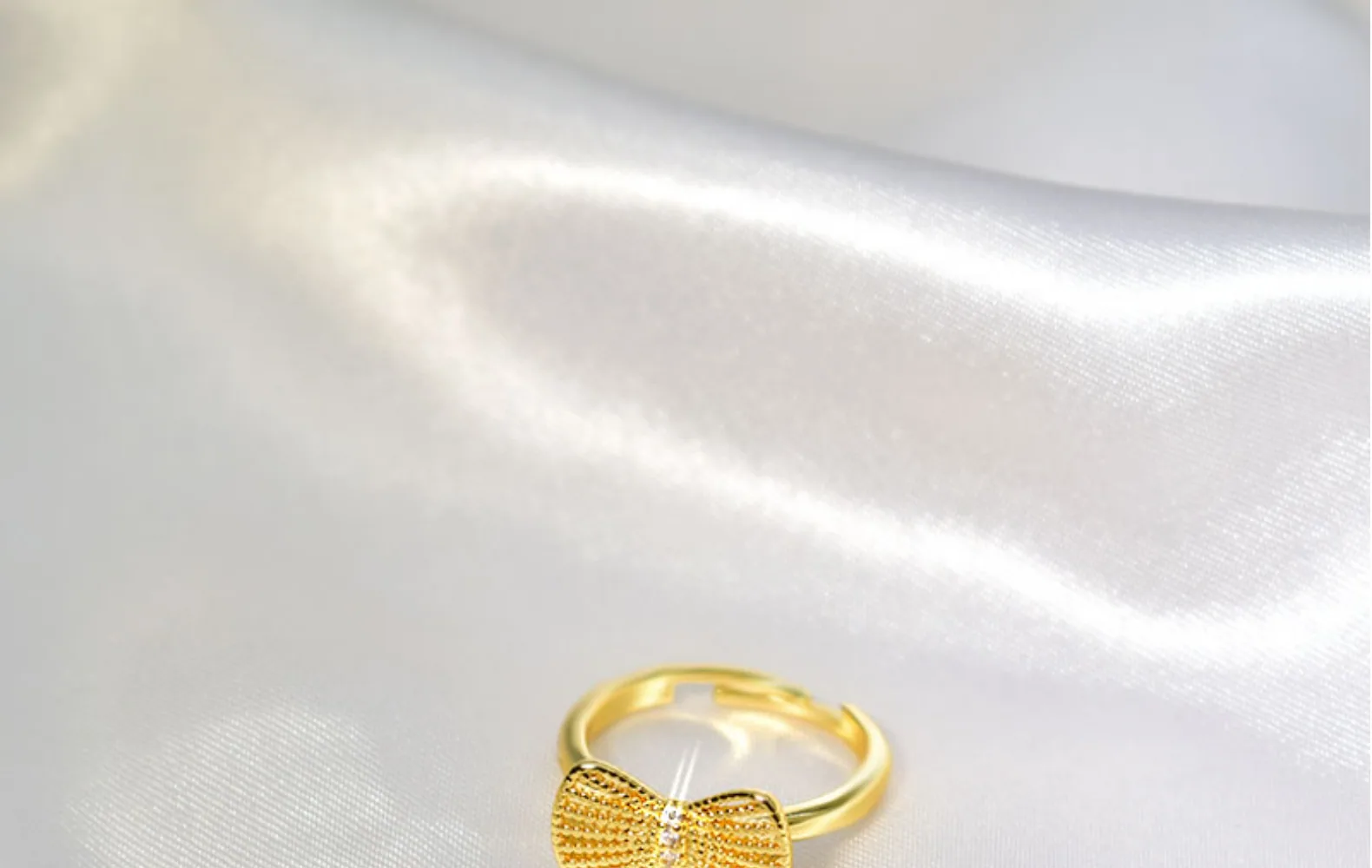 Version coréenne populaire de la même bague à nœud, simple et à la mode, personnalisée pour femmes, index creux, vente en gros 13