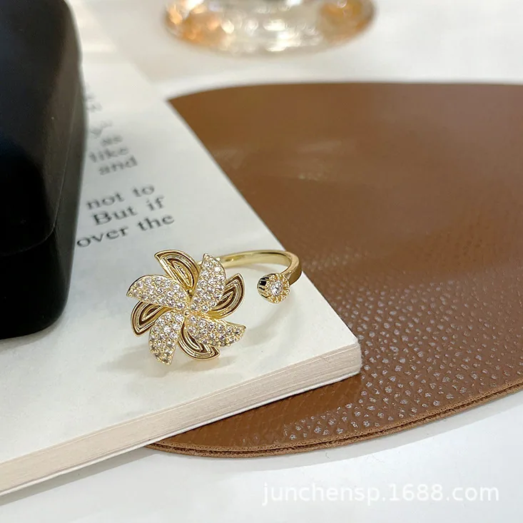 Rotating windmill ring Womens summer niche design comes and goes Gold fashion opening Adjus rotating ring