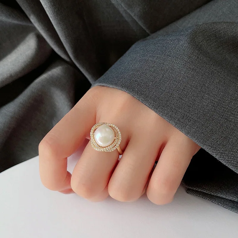 Koreanische Version des Perlenrings für Damen, leichter Luxus, einfache Nische, vielseitiger High-End-Sinn, leicht eingelegter Zirkon-Live-Adjus-Ring 5